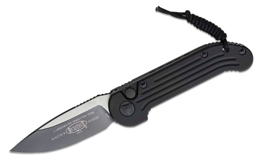 microtech-135-1t-l-u-d-t-automatic-folder-3-42-m390-two-tone-dlc-drop-point-blade-black-anodized-6061-t6-aluminum-handle-push-button-lock
