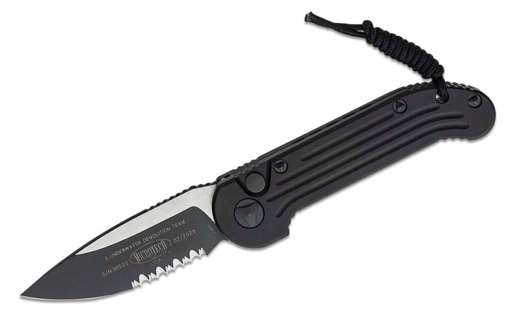 microtech-135-2t-l-u-d-t-automatic-folder-3-42-m390-two-tone-dlc-partially-serrated-drop-point-blade-black-anodized-6061-t6-aluminum-handle-push-button-lock
